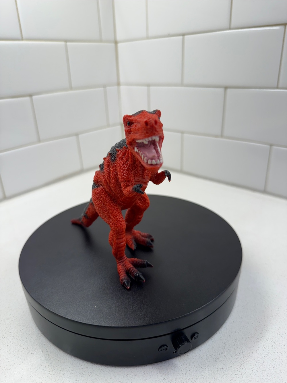 Red T-Rex Dinosaur with Mouth Open and Black Detailing down back, tail, and feet